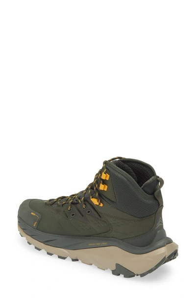 Shop Hoka Kaha 2 Gtx Waterproof Hiking Boot In Duffel Bag / Radiant Yellow