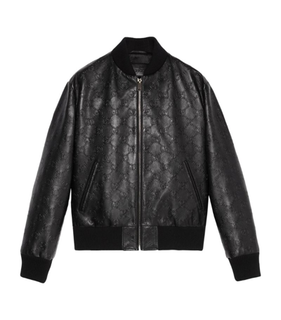 Shop Gucci Leather Gg Supreme Bomber Jacket In Black