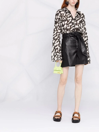 Nanushka Meda Belted Vegan Leather Mini Skirt In Black