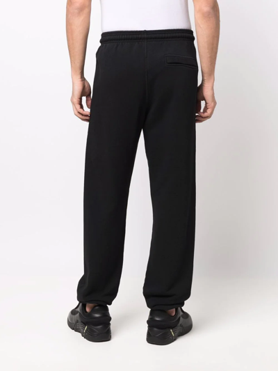 Shop Marcelo Burlon County Of Milan Logo-embroidered Track Pants In Black