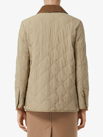 Shop Burberry Quilted Short Jacket In Beige