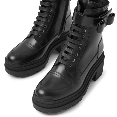 Shop Ferragamo Vara Bow Black Leather Ankle Boots