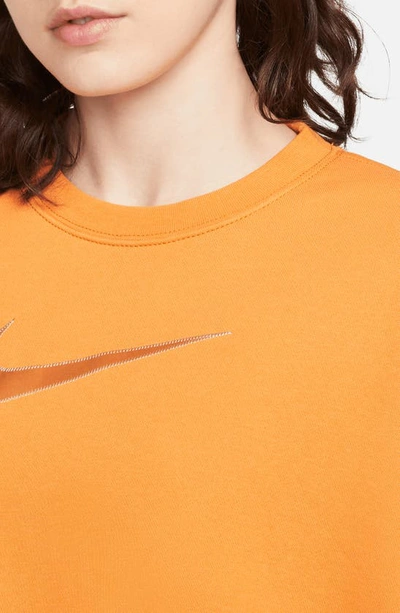 Shop Nike Sportswear Swoosh Oversize Crop Fleece Sweatshirt In Light Curry/ White/ Desert
