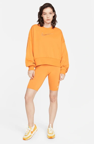 Shop Nike Sportswear Swoosh Oversize Crop Fleece Sweatshirt In Light Curry/ White/ Desert