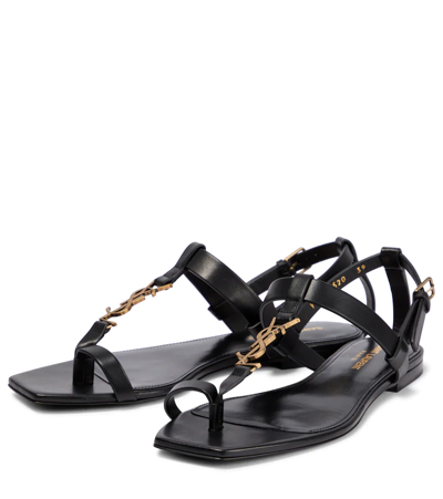 Shop Saint Laurent Cassandra Flat Leather Sandals In Nero