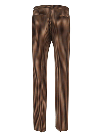 Shop Valentino Geometric Pattern Trousers In Beige