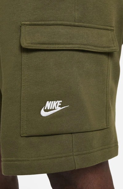 Shop Nike Nsw Club Cargo Shorts In Rough Green/ White