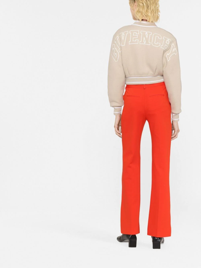 Shop Victoria Beckham Flared Tailored Tousers In Orange