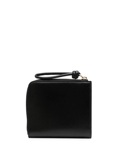 Shop Jil Sander Embossed-logo Detail Wallet In Schwarz