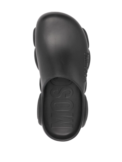 Moschino Round-toe Chunky-sole Slides In Black