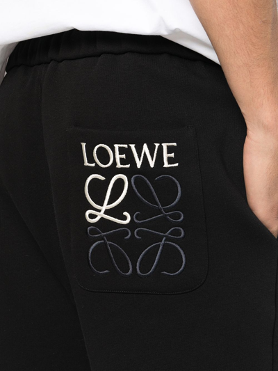 Shop Loewe Embroidered Logo Trousers In Black