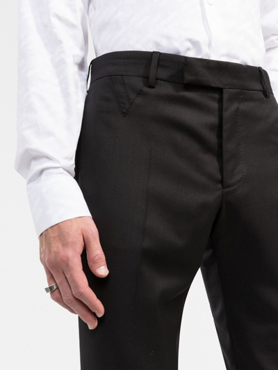 Shop Versace Wool Tailored Trousers In Black