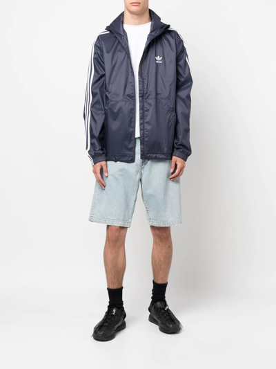 Shop Adidas Originals Zipped Hooded Jacket In Blue