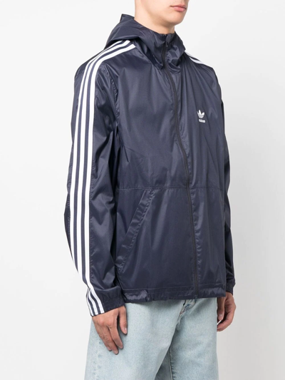 Shop Adidas Originals Zipped Hooded Jacket In Blue