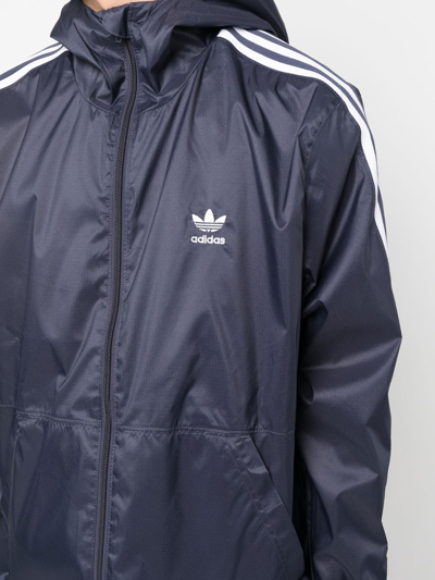 Shop Adidas Originals Zipped Hooded Jacket In Blue