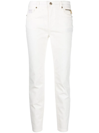 Shop Versace Jeans Couture Skinny Cropped Trousers In White