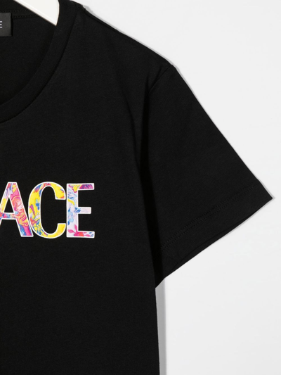 Shop Versace Logo-print Cotton T-shirt In Black