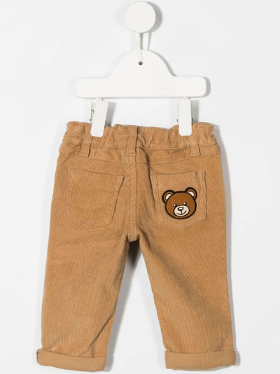 Shop Moschino Corduroy Teddy-bear Patch Trousers In Neutrals
