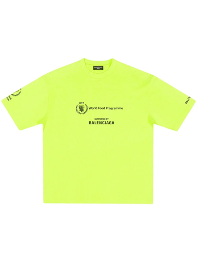 Shop Balenciaga Graphic-print Cotton T-shirt In Yellow