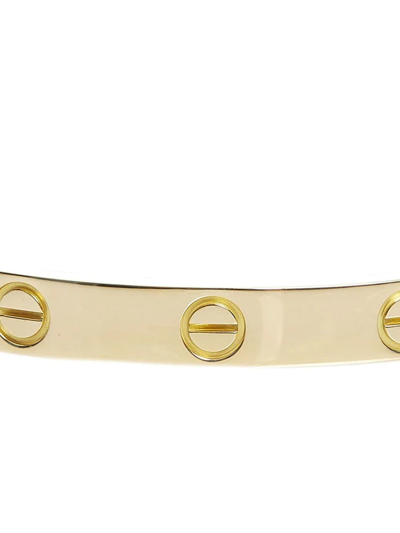 Cartier Love bracelet. Your partner puts it on and locks it. They hold the  key. designed to be opened only…