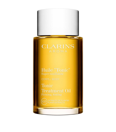 Shop Clarins Tonic Body Treatment Oil (100ml) In Multi
