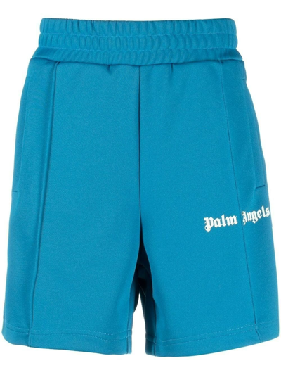 Shop Palm Angels Logo Print Blue Track Shorts