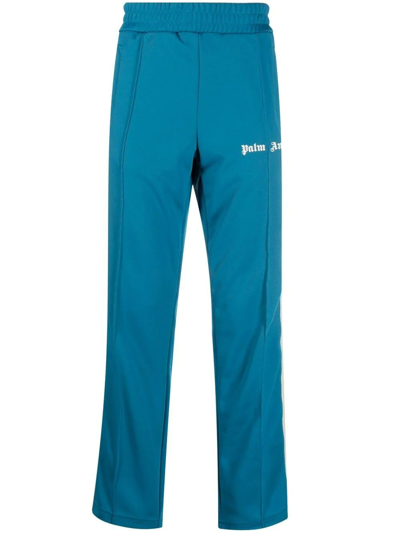 Shop Palm Angels Logo Print Blue Track Pants