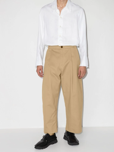 Studio Nicholson Pleated Chino Trousers Featuring Belt Loops In Neutrals