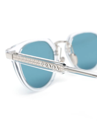 Shop Prada Round-frame Blue-tinted Sunglasses In White