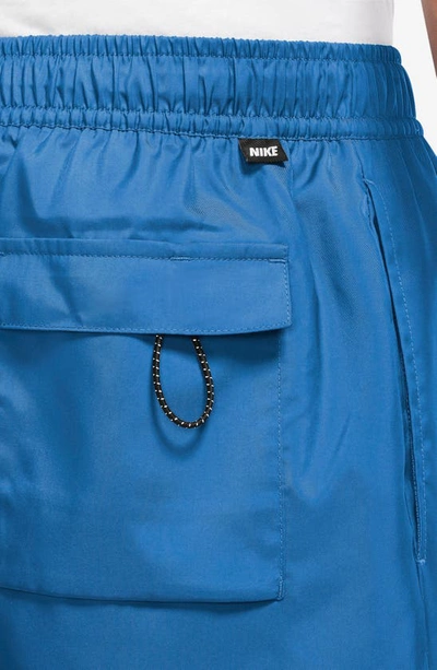 Shop Nike Woven Lined Flow Shorts In Lt Photo Blue/ White