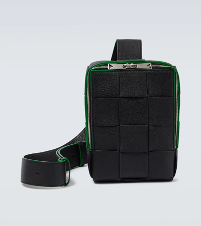 Shop Bottega Veneta Cassette Leather Crossbody Bag In Black-parak/bla-sil