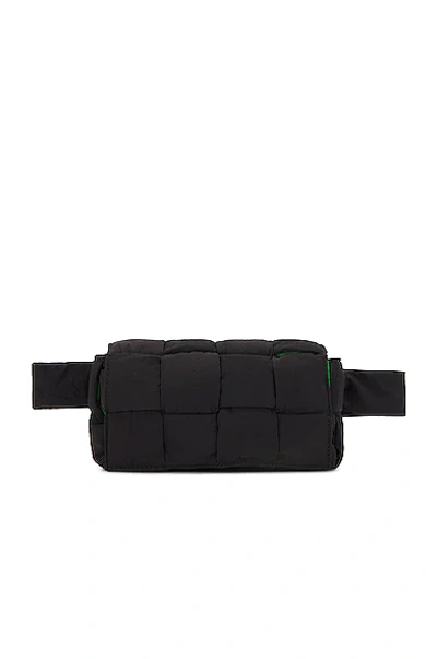 Shop Bottega Veneta Mini Cassette Padded Belt Bag In Black & Parakeet