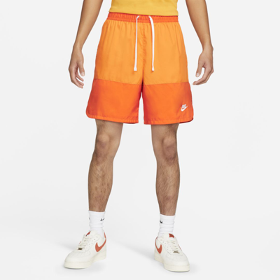 Shop Nike Men's  Sportswear Sport Essential Woven Lined Flow Shorts (long) In Orange