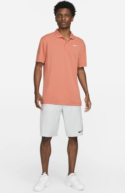 Shop Nike Court Dri-fit Polo In Madder Root/ White