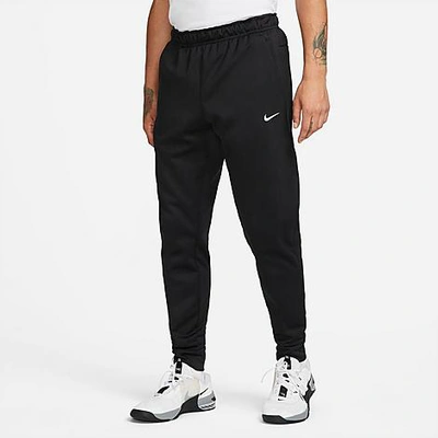 Shop Nike Men's Therma-fit Tapered Fitness Sweatpants In Black/black/white