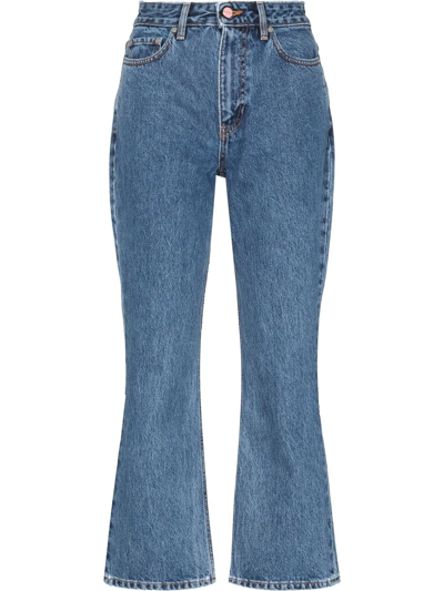 Shop Ganni Betzy Organic Cotton Flared Cropped Jeans In Blue