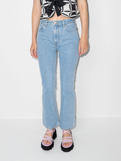 Shop Ganni Betzy Flared Jeans In Blue