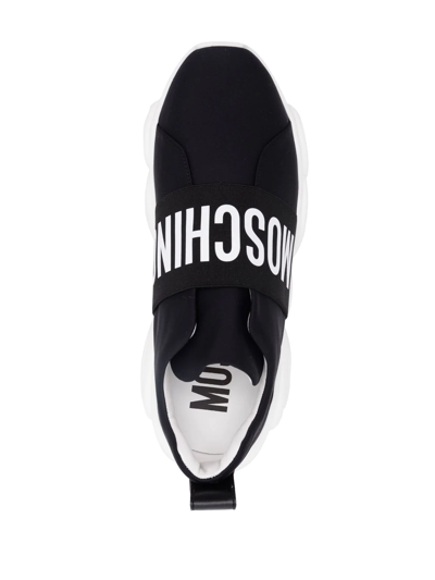 Shop Moschino Logo-print Low-top Sneakers In Schwarz