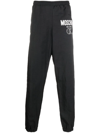 Shop Moschino Logo-print Straight-leg Track Pants In Schwarz