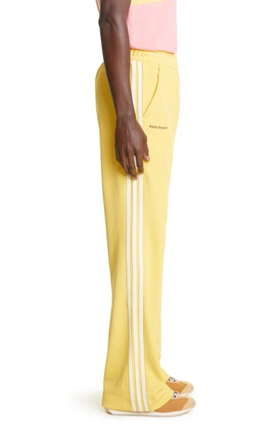 Shop Adidas X Wales Bonner 3-stripes Recycled Polyester Track Pants In St Fade Gold