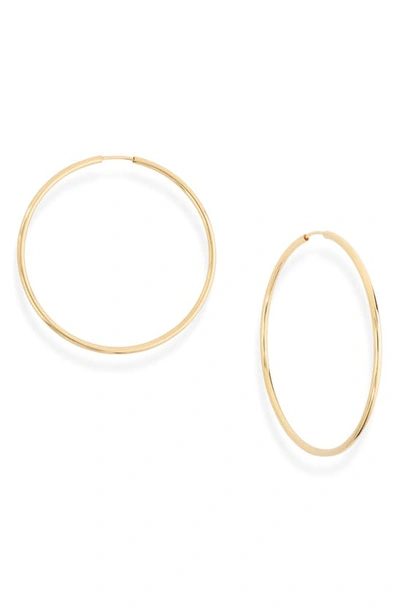 Shop Shashi Classic Hoop Earrings In Gold