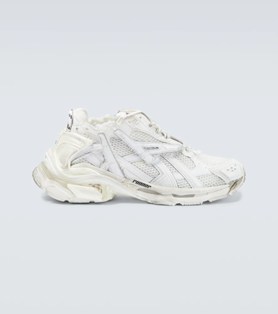 Shop Balenciaga Runner Sneakers In White