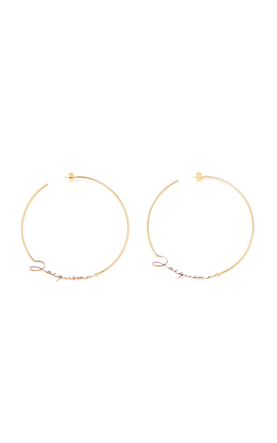 Shop Jacquemus Les Creoles Gold-tone Logo Earrings