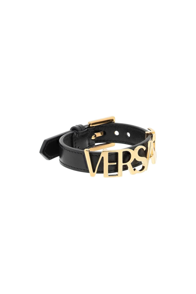 Shop Versace Lettering Logo Leather Bracelet In Multicolor