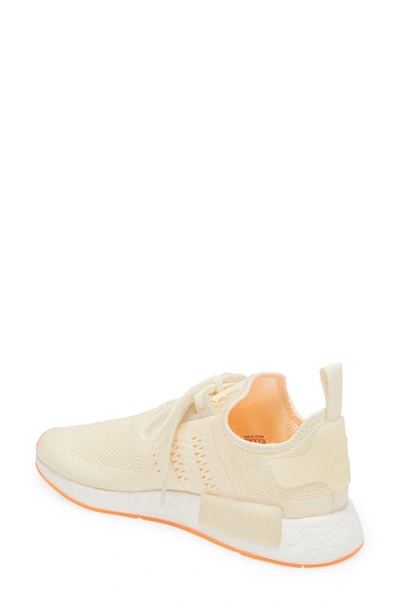 Shop Adidas Originals Originals Nmd R1 Sneaker In Cream White/ Screaming Orange