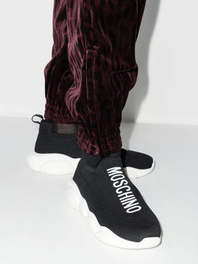 Shop Moschino Logo-print Sock-style Sneakers In Schwarz