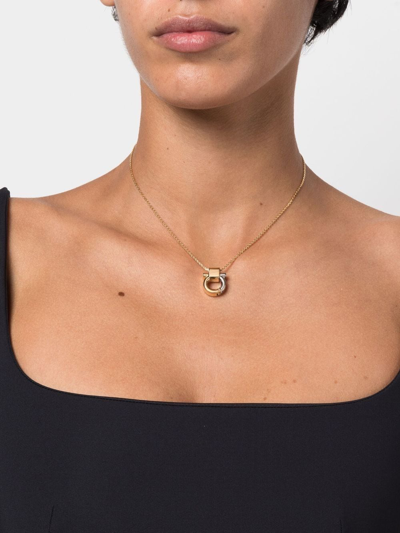 Shop Ferragamo Gancini Pendant Necklace In Gold