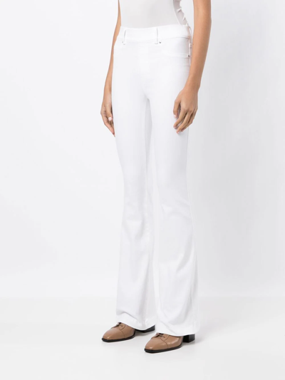 Shop Spanx High-waist Skinny Flared Jeans In Weiss