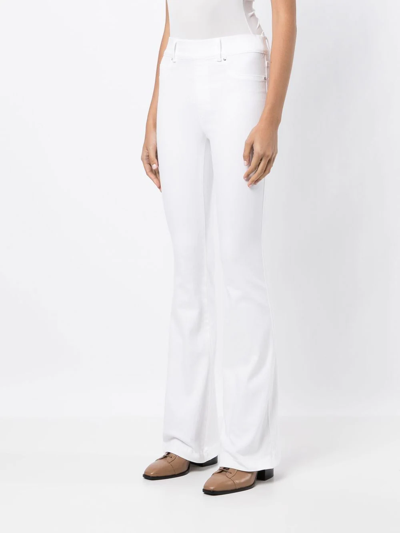 Spanx Skinny Flare High-rise Stretch-denim Jeans In Weiss