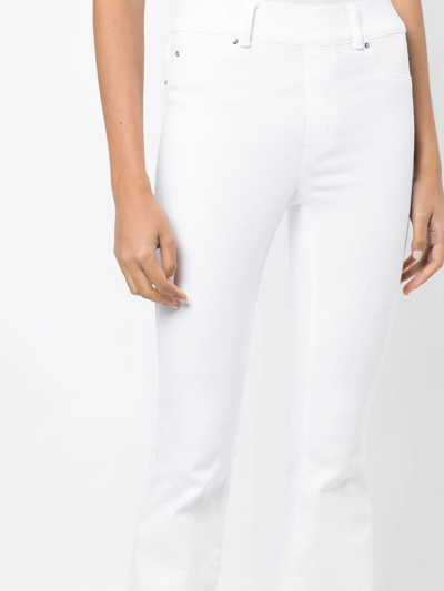 Shop Spanx High-waist Skinny Flared Jeans In Weiss